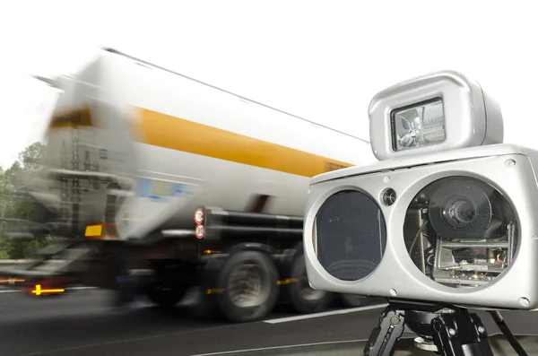 Speed camera and truck on road