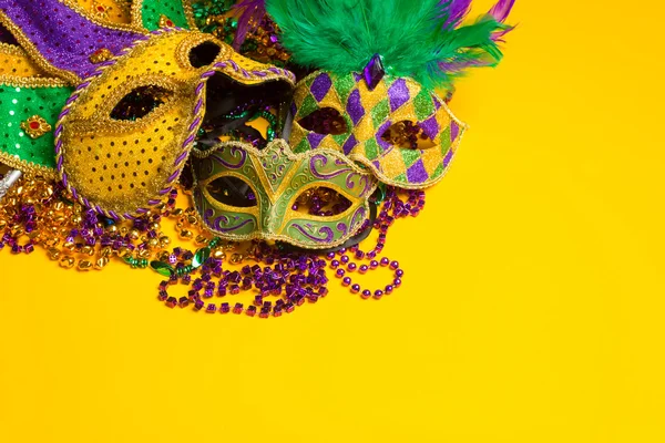Colorful group of Mardi Gras or venetian mask or costumes on a y