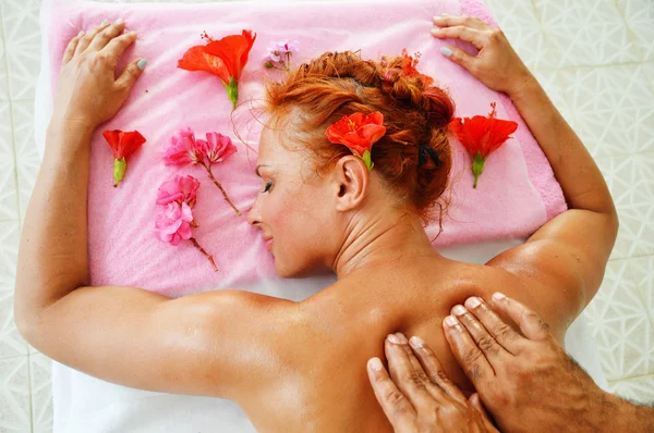 Young woman getting professional spa massage