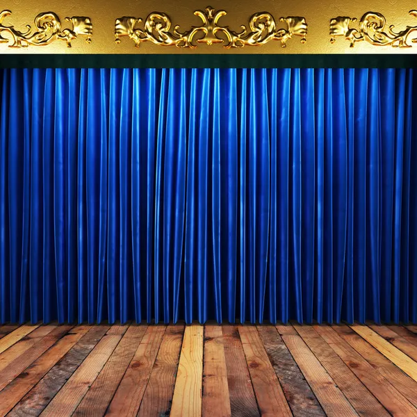 Blue fabric curtain with gold on stage — Stock Photo #36565803