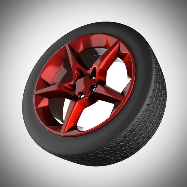 Car wheel on gray background