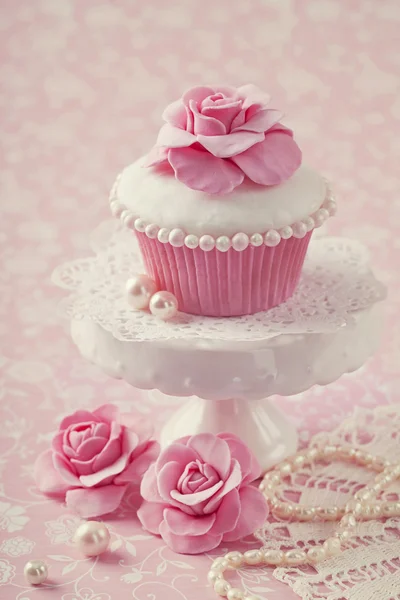 Cupcake with rose flower