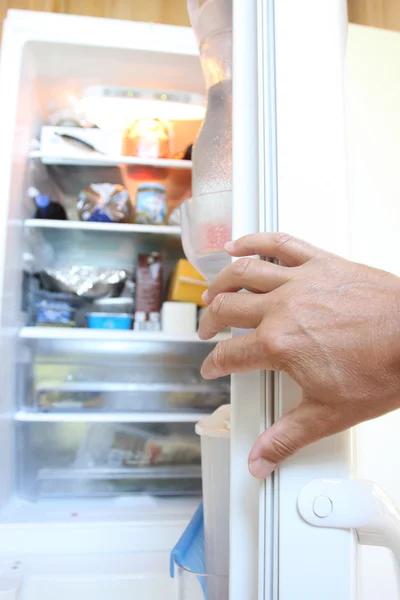 Opening the fridge
