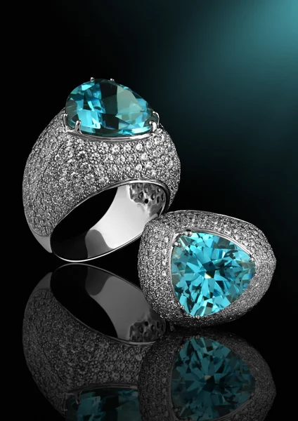 Silver ring with diamonds and topaz