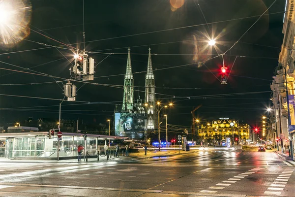 Vienna, Swedenplace at night with traffic lights with view to th