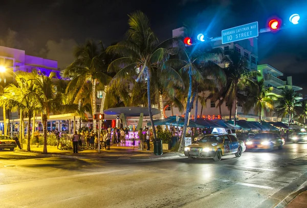 People enjoy nightlive at ocean drive in south Beach