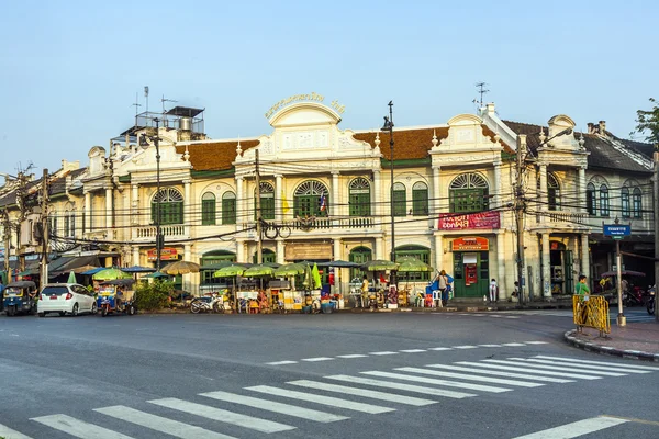 Historic building in Bangkok with street market in front