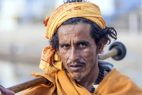 A Rajasthani tribal man wearing traditional colorful turban