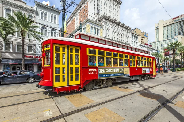 Passengers travel with the street car at Canal street downtown N