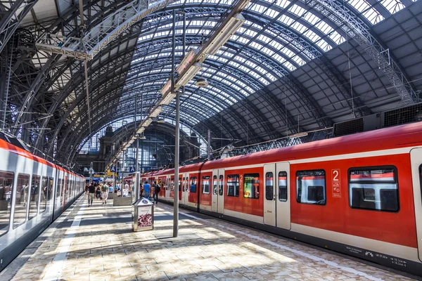 Travelers inside the Frankfurt central station heading or leavin