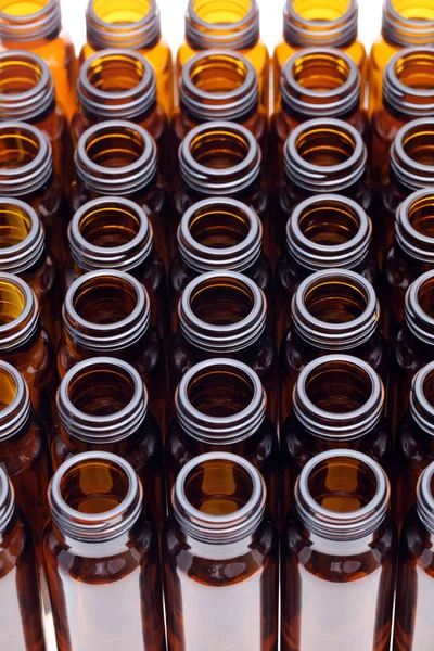 Rows of brown glass bottles