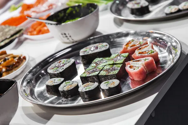 Dish with Japanese sushi rolls