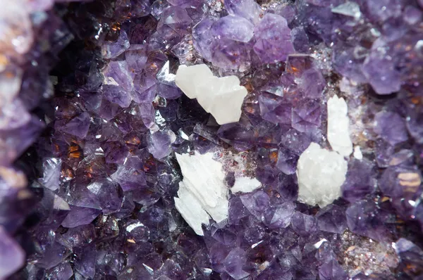 A large sample of amethyst mineral. This gemstone makes beautiful jewelry.