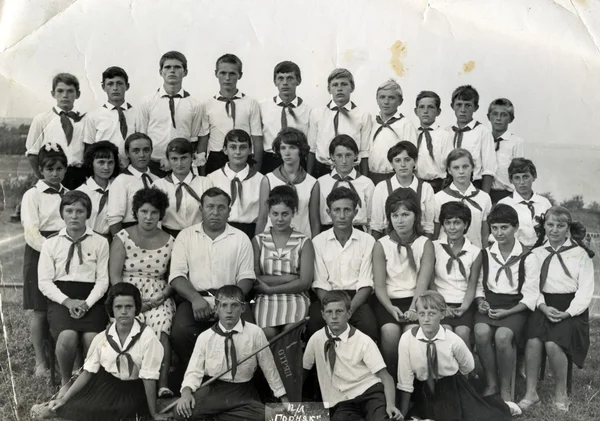 USSR, Ukraine - CIRCA 1950s: Group portrait of school pupils in uniforms.