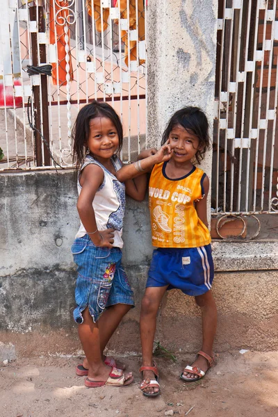 Two young girls posing outside in Siem Reap Cambodia