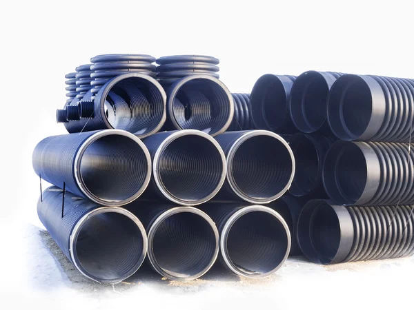 Large black plastic drain pipes