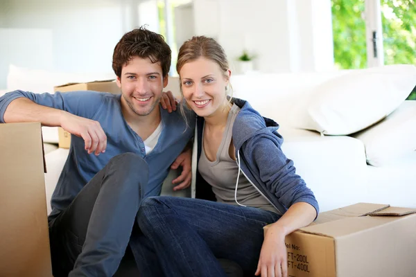 Young couple moving in their home