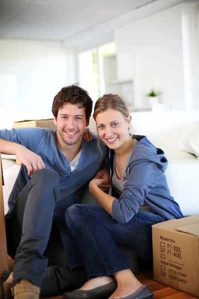 Young couple moving in their home