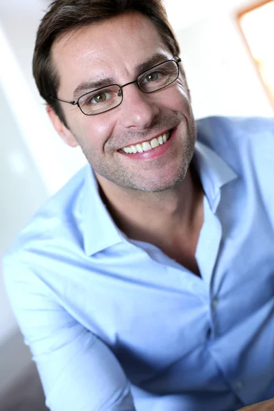 Smiling mature man wearing eyeglasses