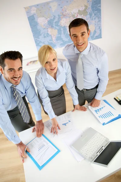 Upper view of business people working in office