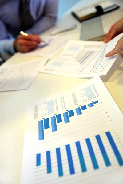 Closeup on business papers set on table