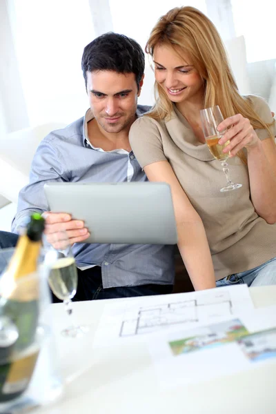 Couple celebrating construction of new home