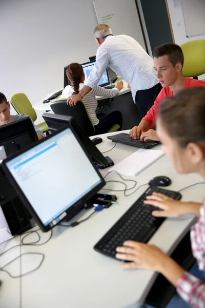 Young people in computer\'s lab