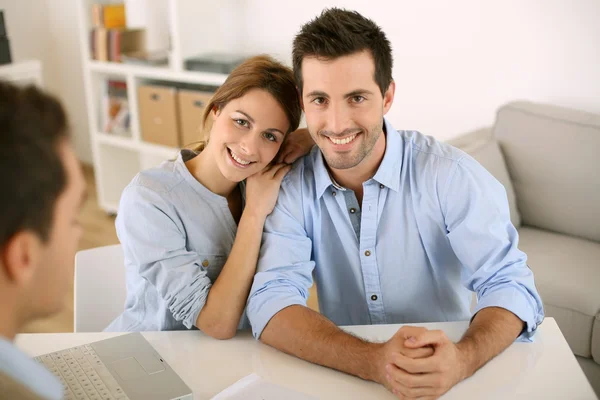 Couple in real-estate agency