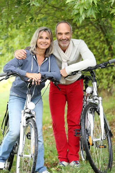 Senior couple with bicycle