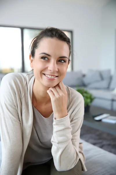 Smiling woman at home