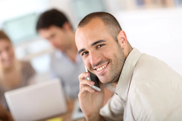 Salesman talking on phone