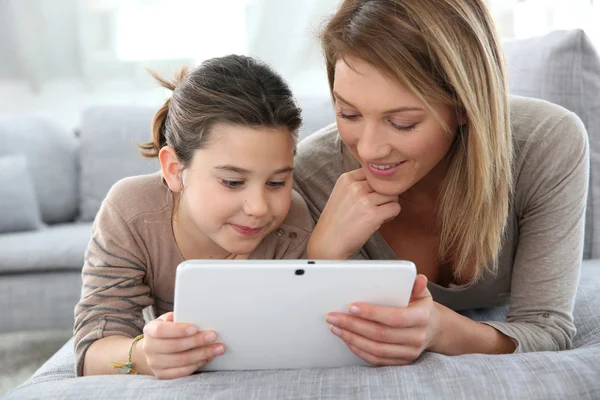 Mother and daughter with tablet