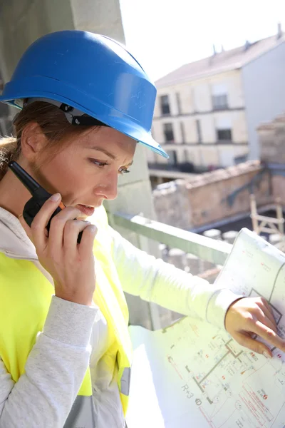 Woman engineer with radio set