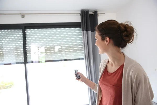 Woman using remote control