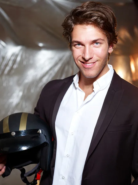 Portrait of an attractive young man with helmet