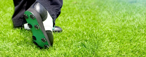 Sole of golfer's shoe