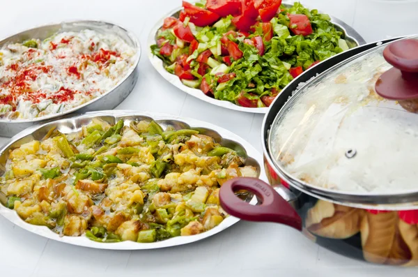 Traditional Turkish homemade food- rice, salad, fried vegs