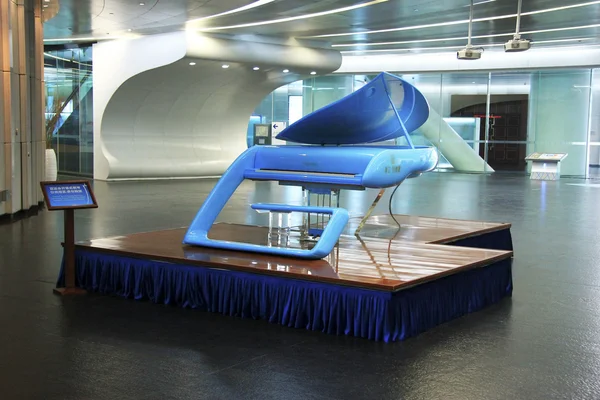 Blue hi-tech grand piano in the hall of Canton tower