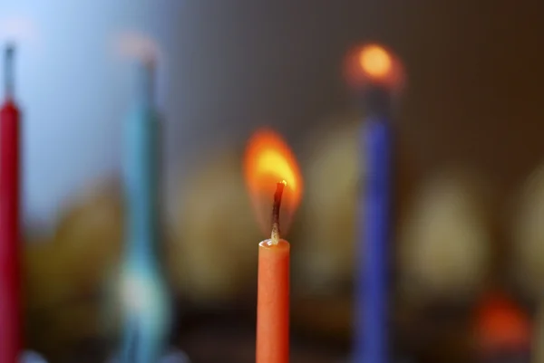 Colorful candles with flame