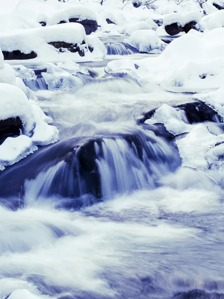 Winter river in Beskid mountains, Poland