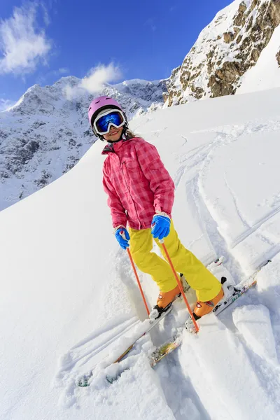 Skier, skiing, winter sport - portrait of happy girl skier