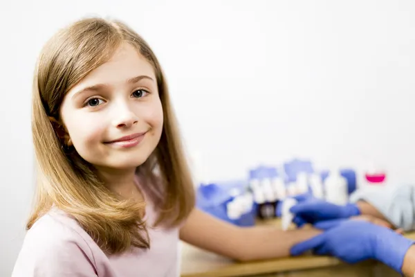 Allergy - skin prick tests, cute girl in a laboratory