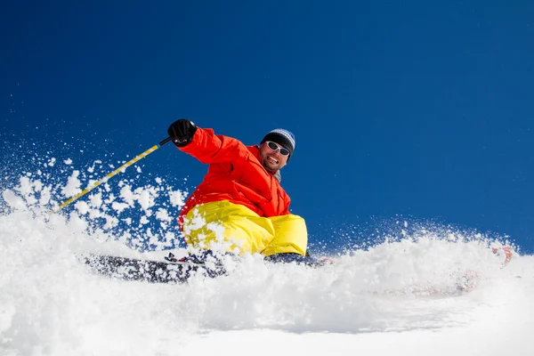 Ski, Skier, Freeride in fresh powder snow - man skiing downhill