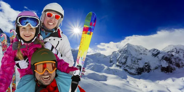 Winter, ski, skiers, snow  - family enjoying ski holiday