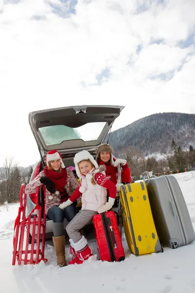 Winter, travel - family with baggage ready for the travel for winter vacation