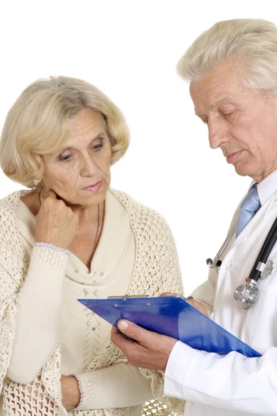 Elderly doctor with a patient