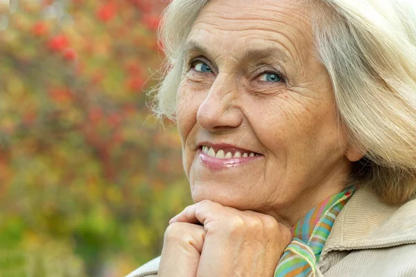 Old happy woman posing