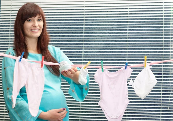 Pregnant woman baby clothes
