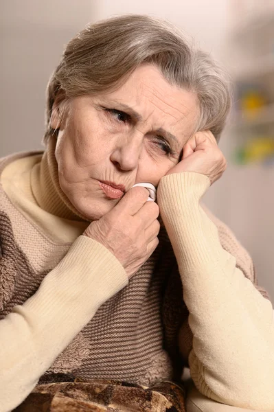 Senior woman with tooth pain