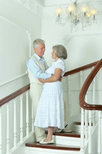 Elderly couple  on stairs